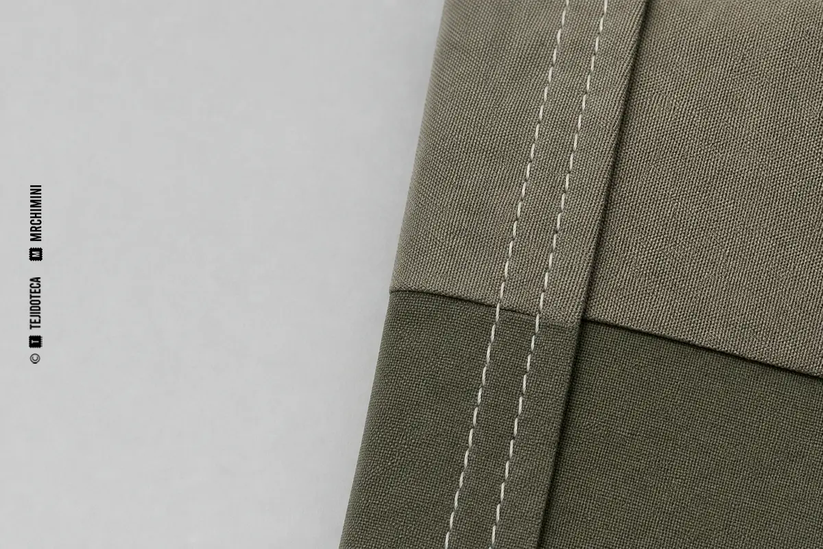 COSTURA SOLAPADA – TEJIDOTECA Representación técnica de costura solapada en confección textil.