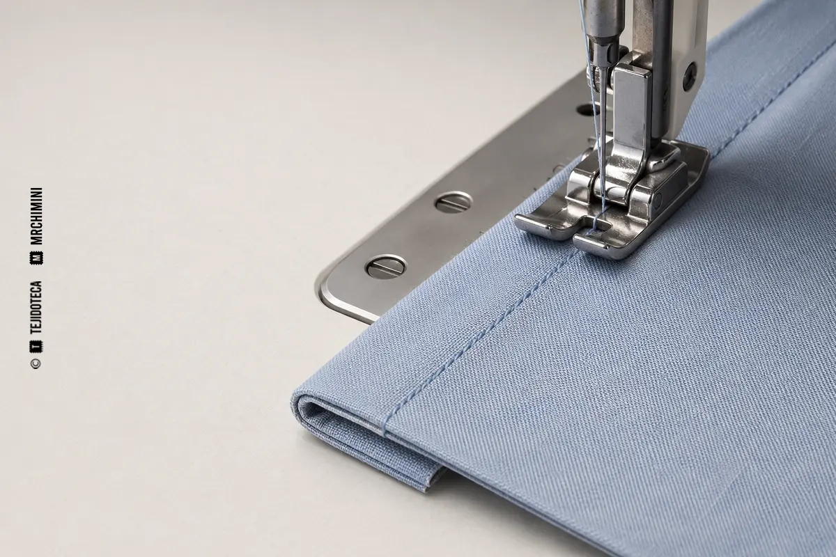 DOBLADILLO – TEJIDOTECA Representación técnica de dobladillo en confección textil.