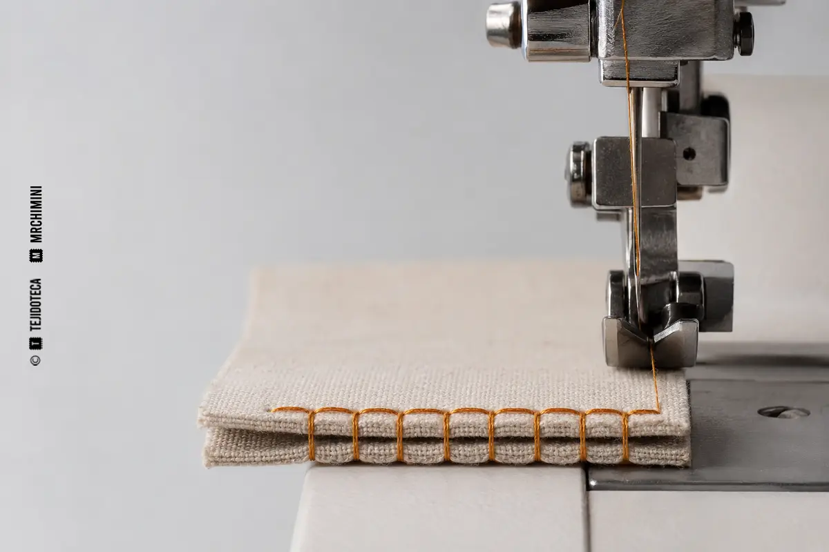 Representación técnica de puntada en confección textil.