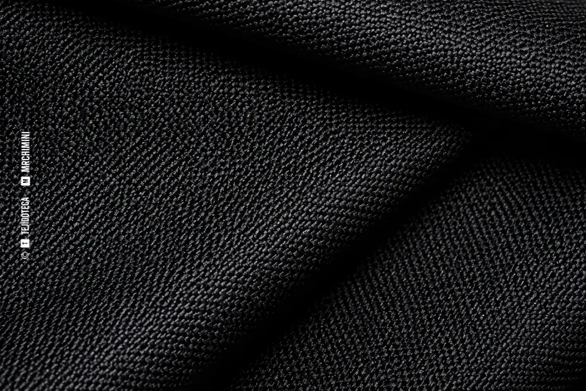 Macro del tejido técnico CORDURA® negro de construcción compacta