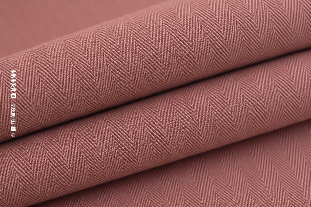 Macrofotografía de tejido coutil en rosa empolvado #B88B8E