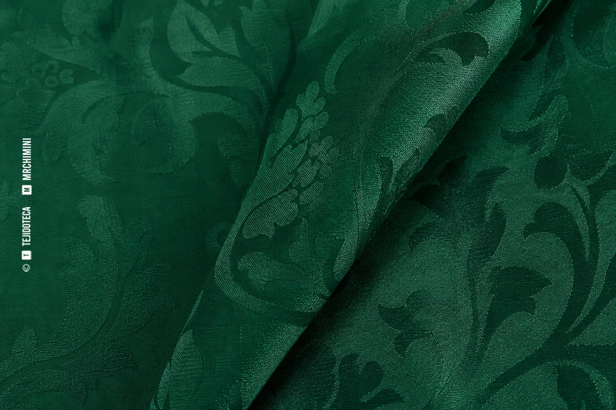 Macrofotografía de tejido damasco en verde esmeralda #075B4B tono sobre tono