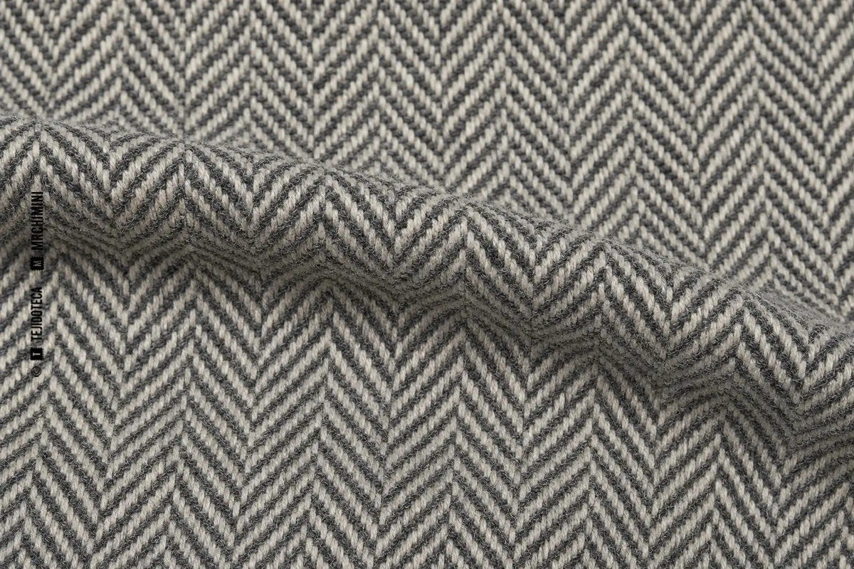 Tejido de espiga con diagonales quebradas en forma de V
