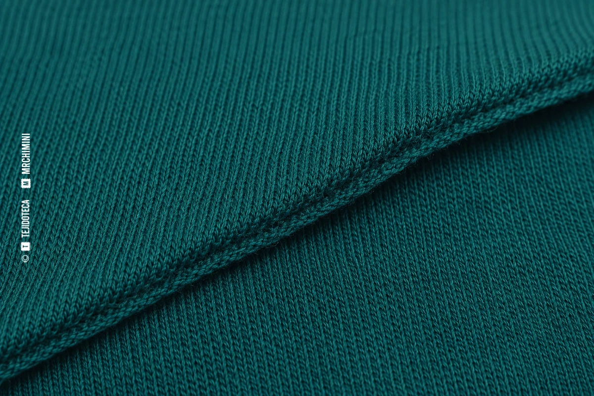 interlock-tejidoteca-1200×800 Macrofotografía de punto interlock en verde azulado profundo #176B6B