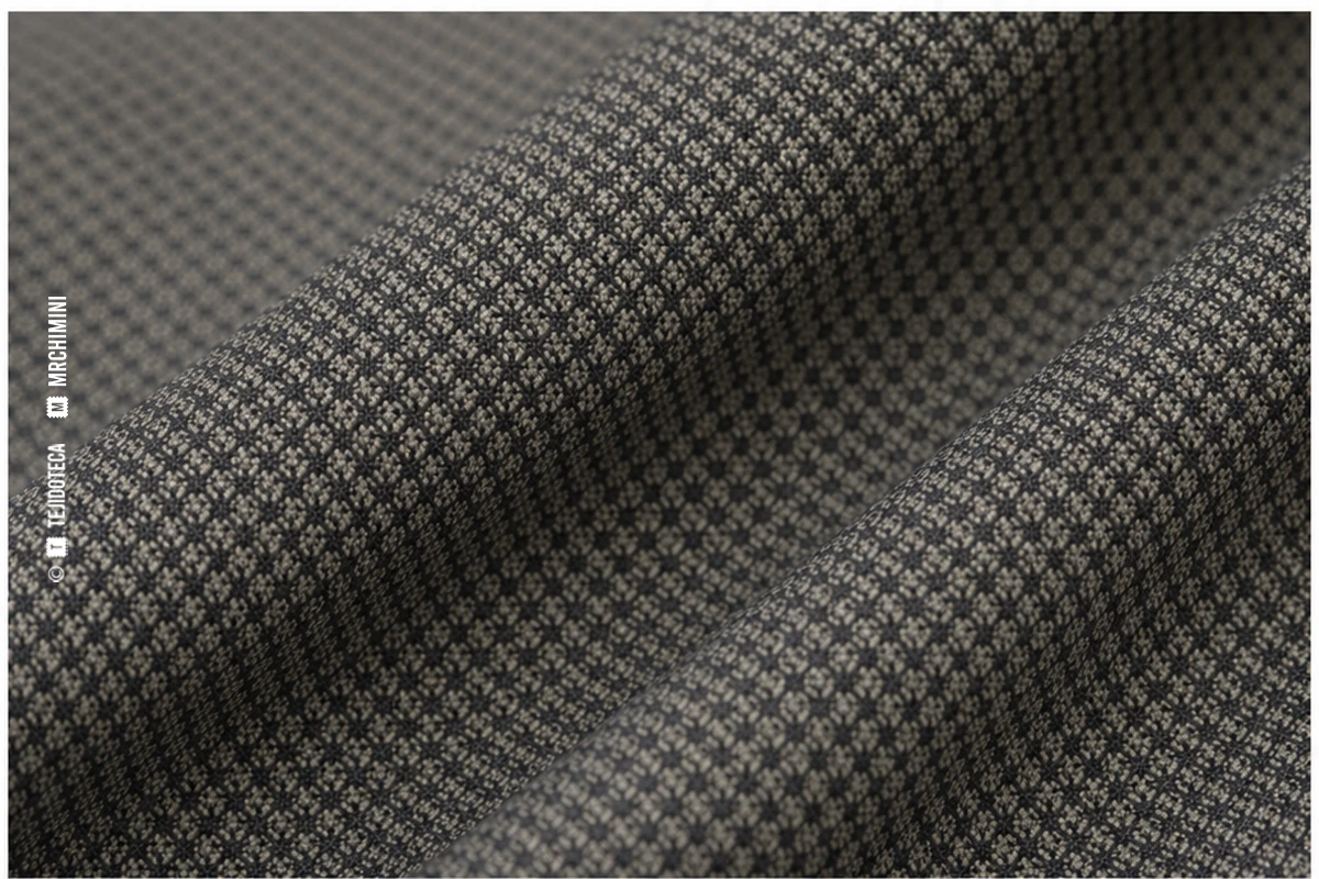 Macrofotografía de tejido ojo de perdiz en gris grafito y marfil