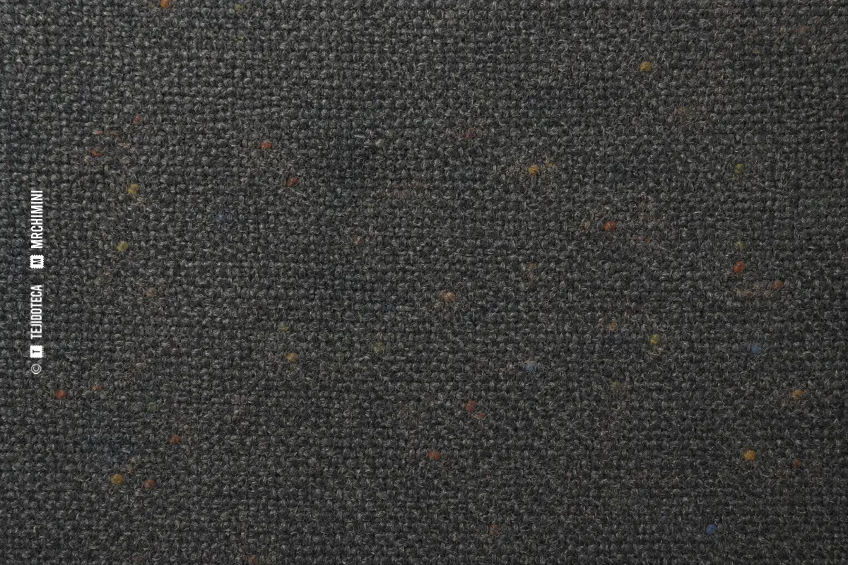 Macro de Donegal tweed gris con neps de colores
