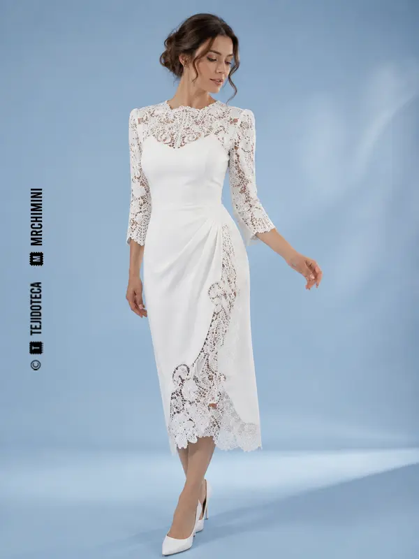 Vestido blanco con paneles de encaje de aguja