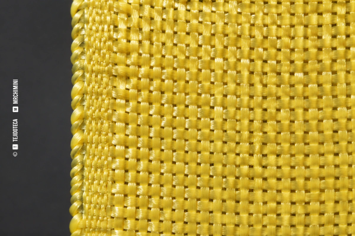Macro de tejido KEVLAR® amarillo de para-aramida con ligamento tafetán