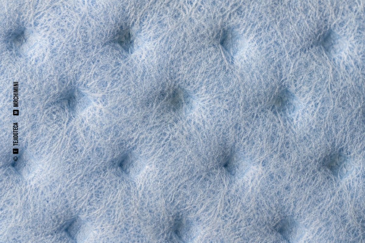 Macro de no tejido termoligado azul claro con puntos de unión térmica