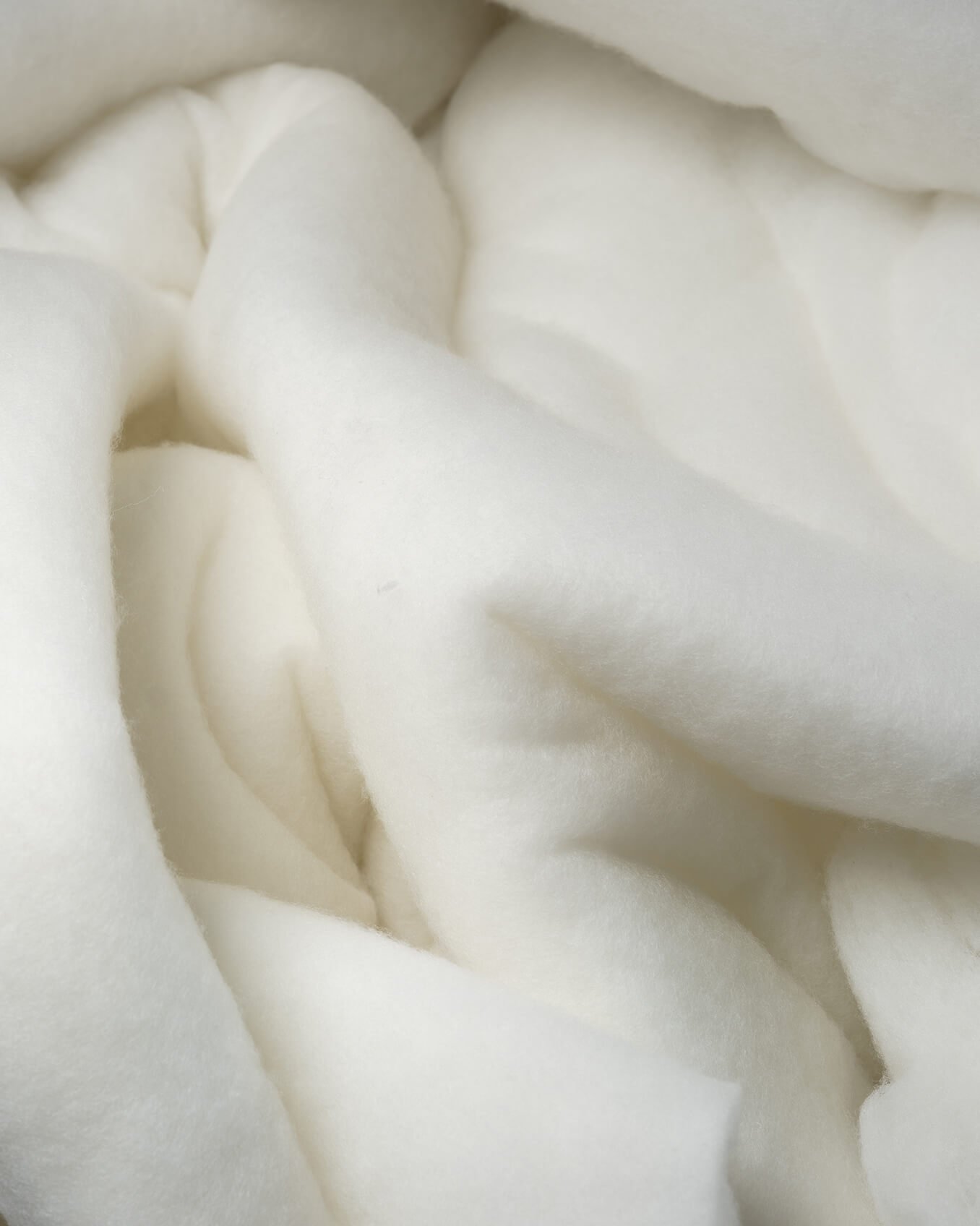 Detalle de relleno aislante blanco publicado por PrimaLoft