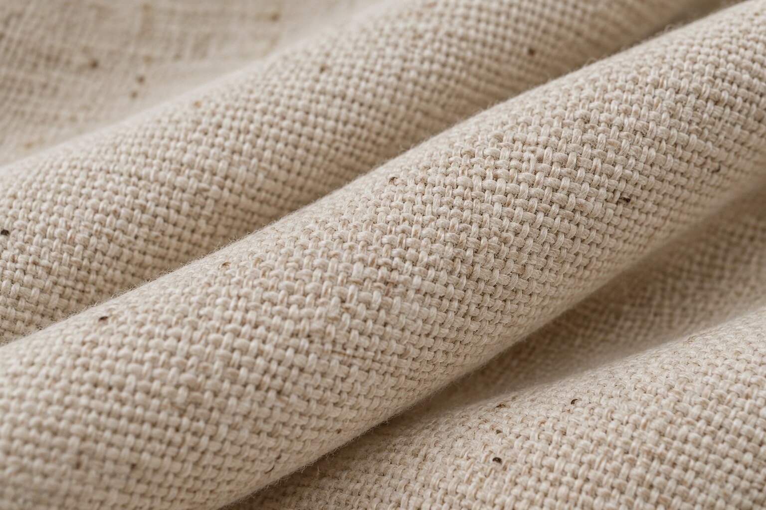 Detalle ilustrativo de osnaburgo crudo con hilos visibles y textura rústica