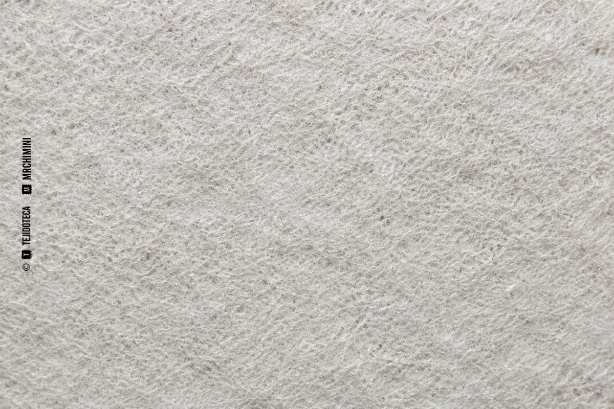 Macro de no tejido wetlaid crudo con fibras cortas distribuidas en medio acuoso