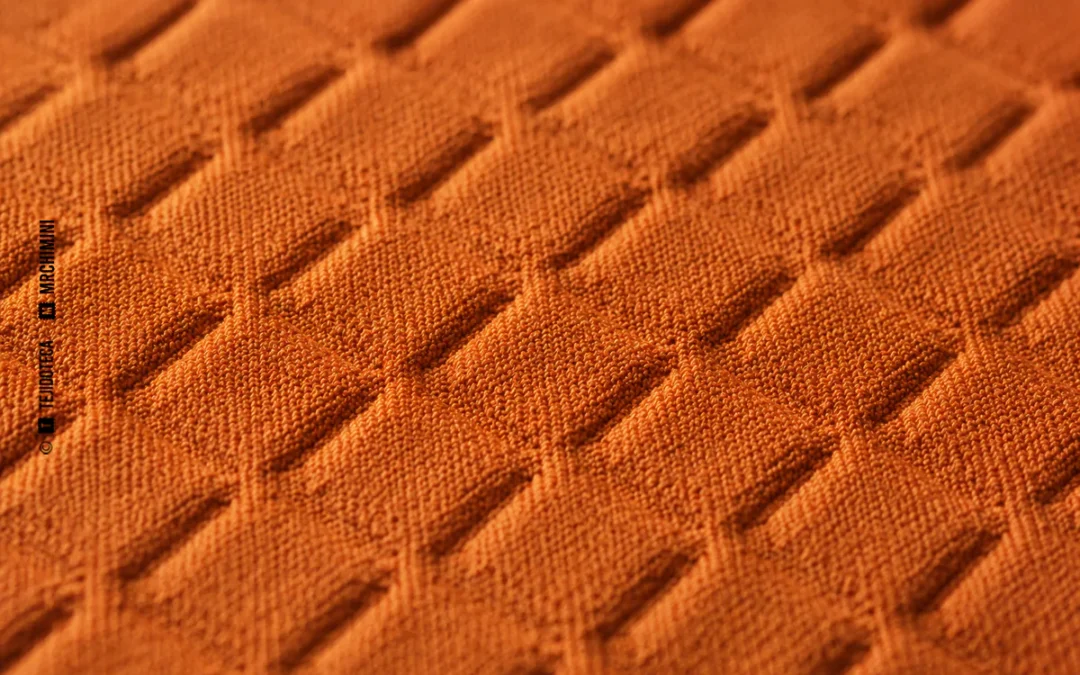 Detalle macro de un tejido con acabado gofrado en relieve